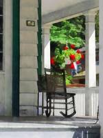 Porch With Rocking Chair and Geraniums