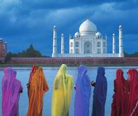 Women In Colorful Saris In Front Of The Taj Mahal
