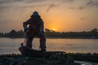 Lone Fisherman Sunset