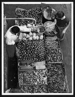 Overhead view of a pushcart produce stand on Belmo