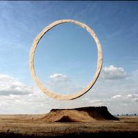 colossal  minimalistic  wheel  sculpture  landscap