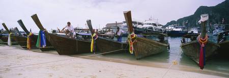 Longtail boats moored on the beach